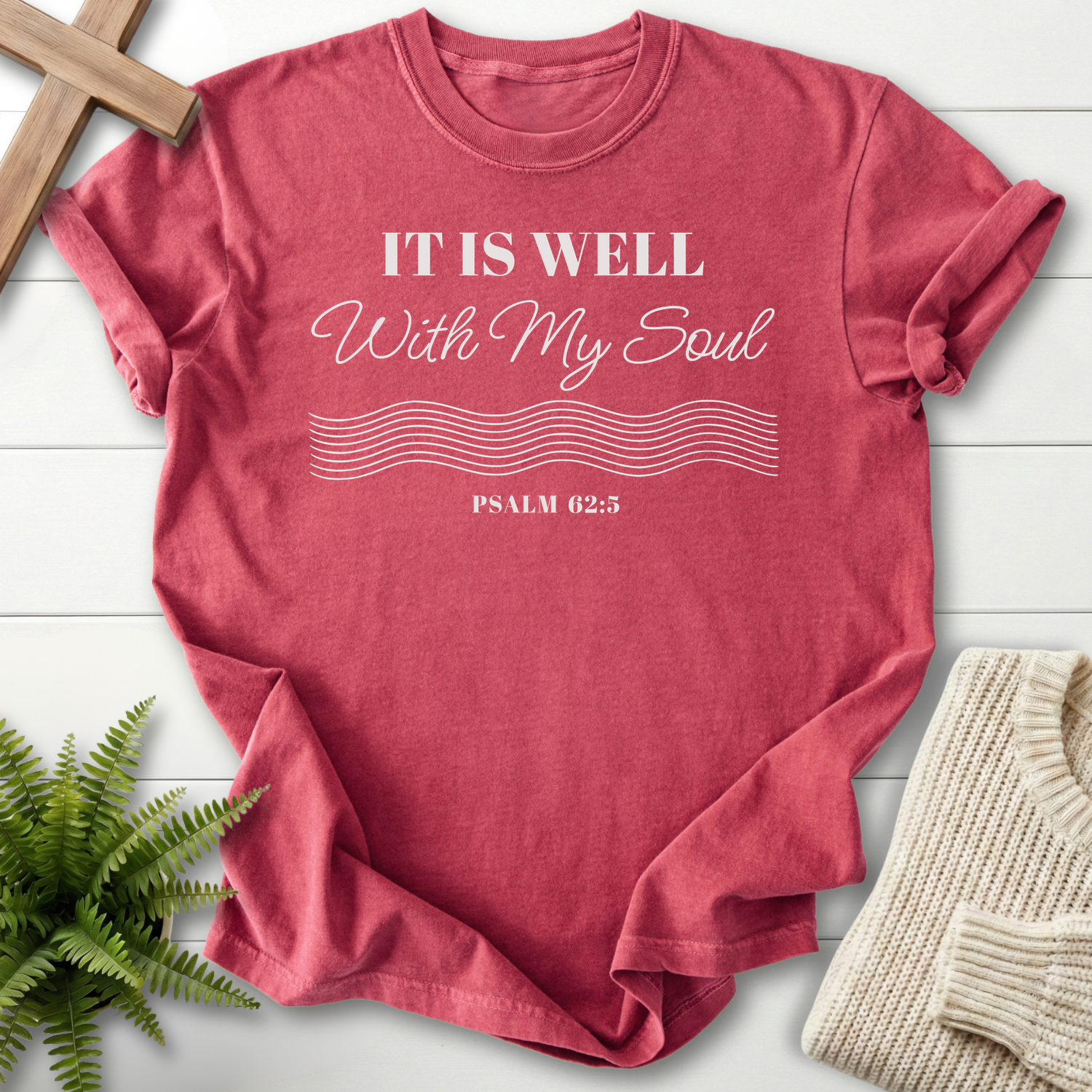 Crimson women's Christian t-shirt with "It Is Well With My Soul" wave typography, inspired by Psalm 62:5