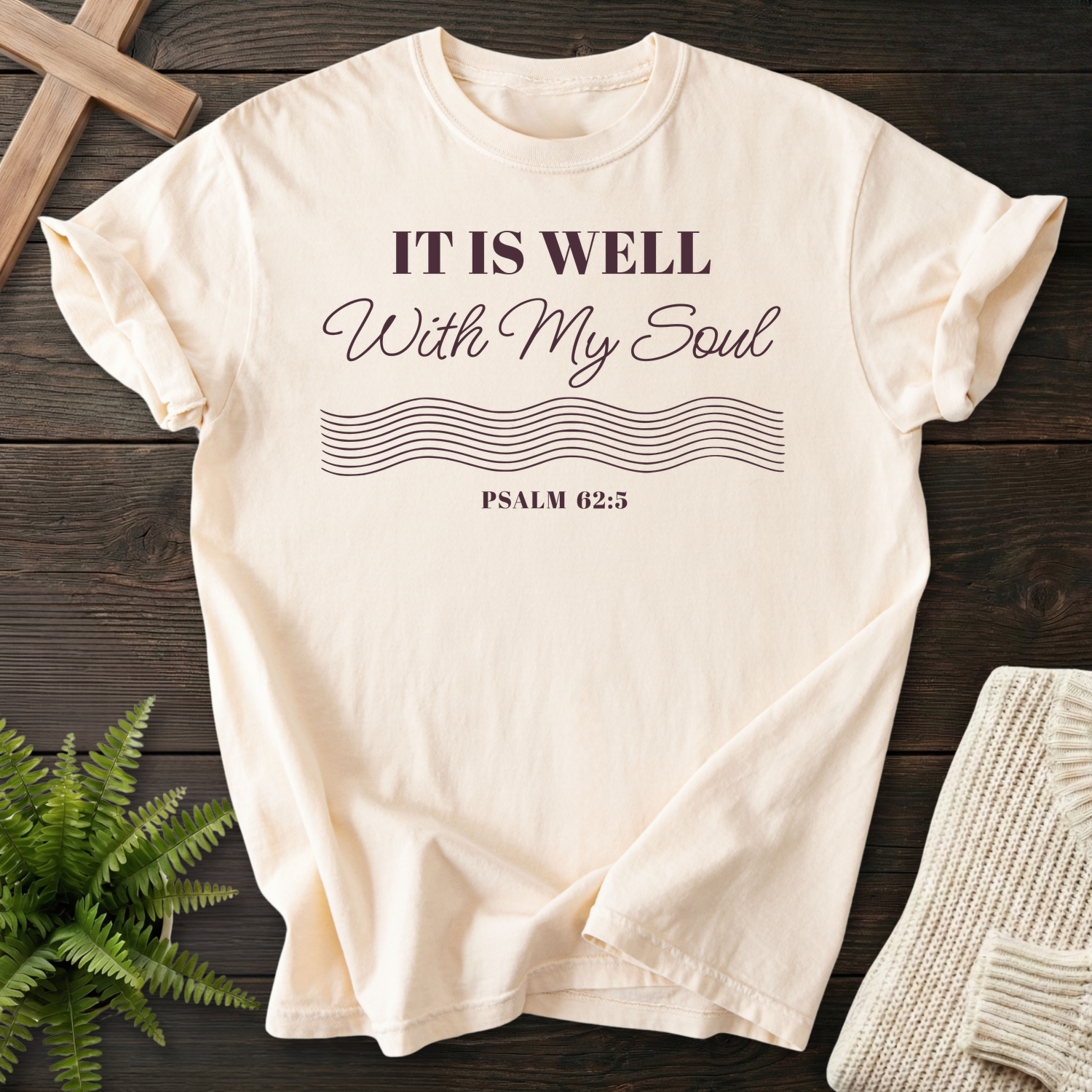 Ivory women's Christian t-shirt with elegant "It Is Well With My Soul" lettering and flowing lines, inspired by Psalm 62:5