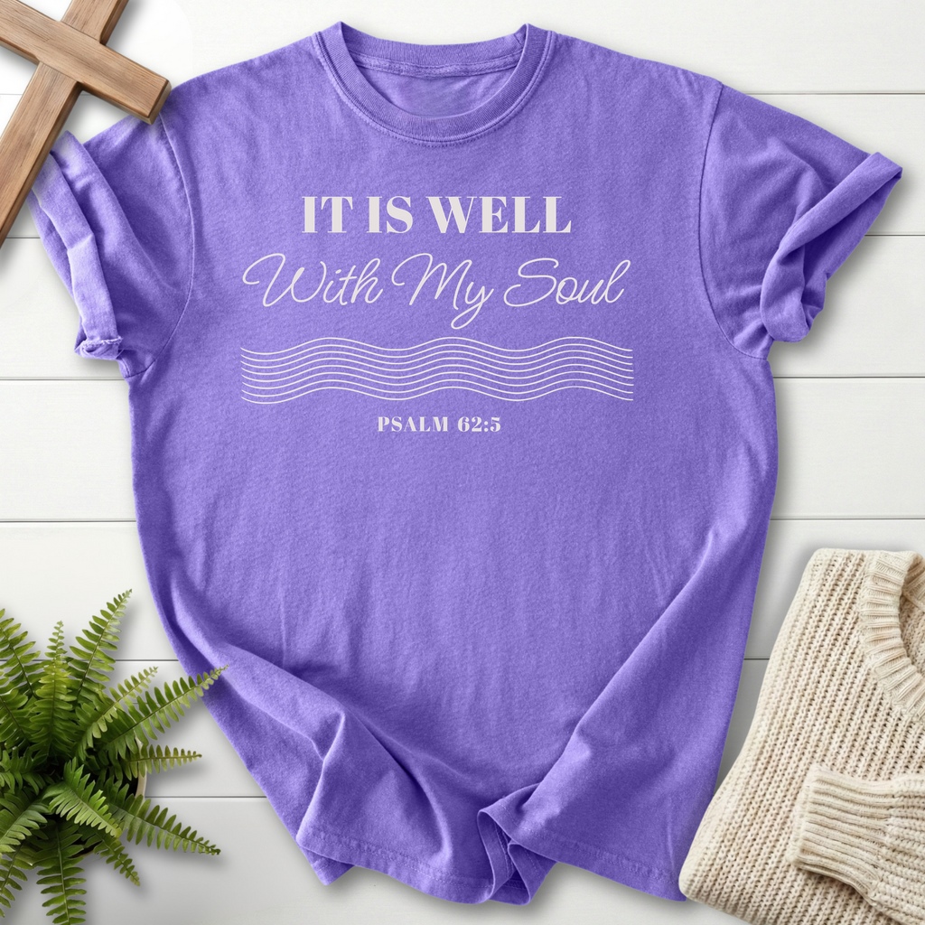 Violet women's Christian t-shirt with white "It Is Well With My Soul" text and wave lines, inspired by Psalm 62:5