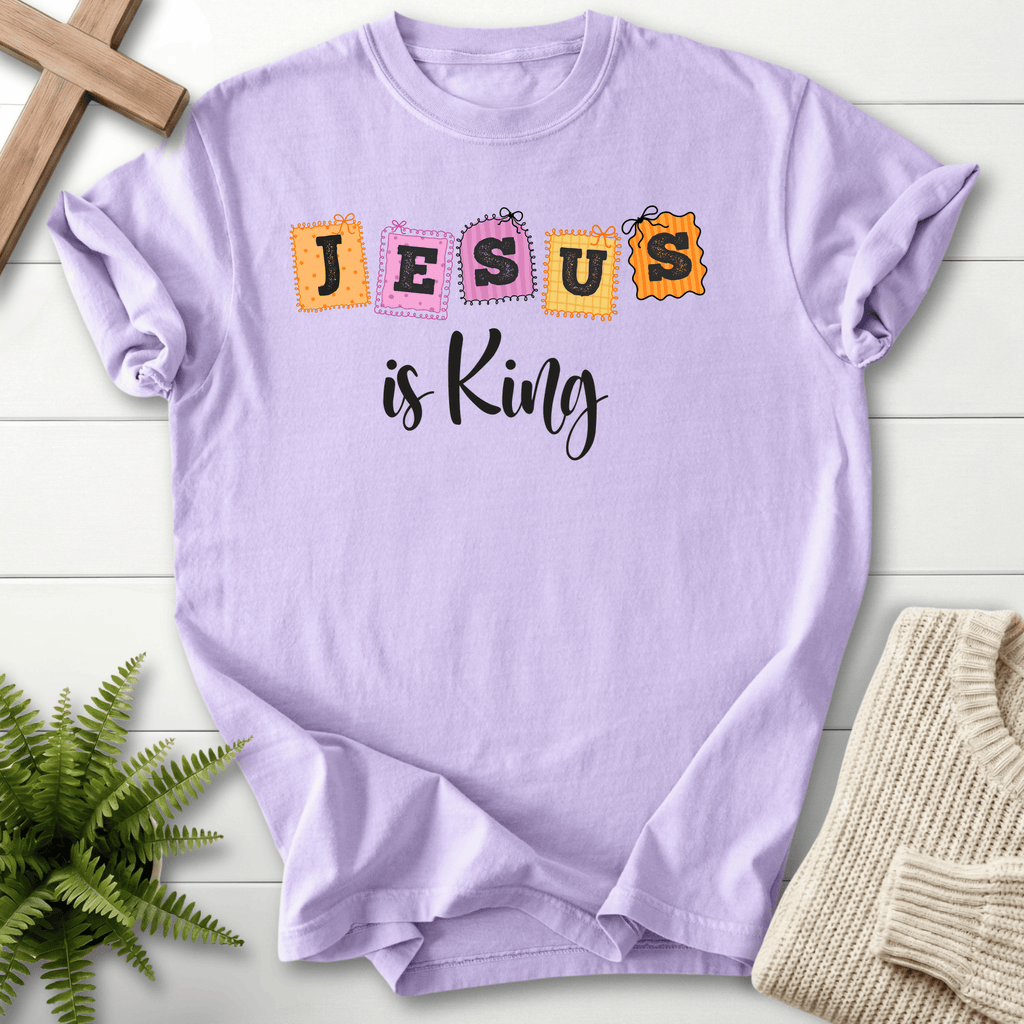 Orchid women's Christian t-shirt with "JESUS is King" in orange and pink patchwork stamp design, Comfort Colors 1717