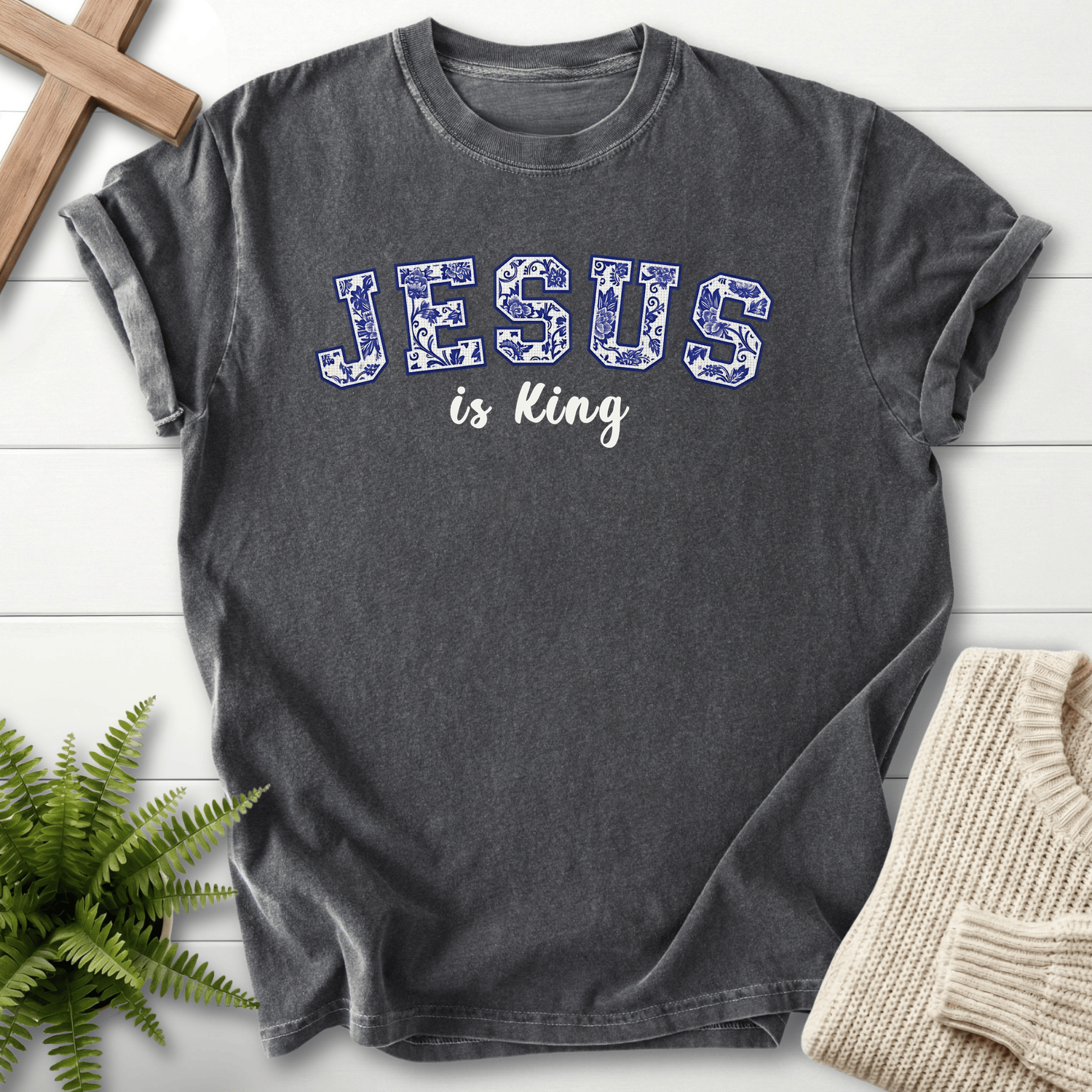 Pepper women's Christian t-shirt with floral varsity "JESUS is King" lettering in blue flower print