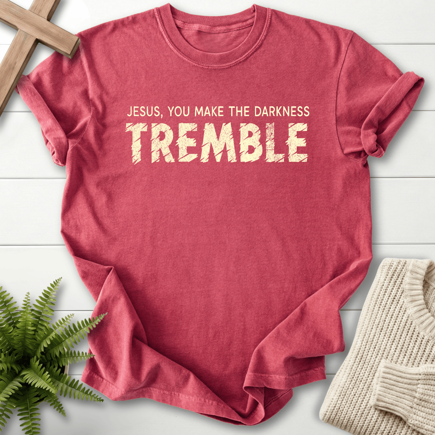 Crimson women's Christian t-shirt with distressed "Jesus You Make the Darkness Tremble" block lettering