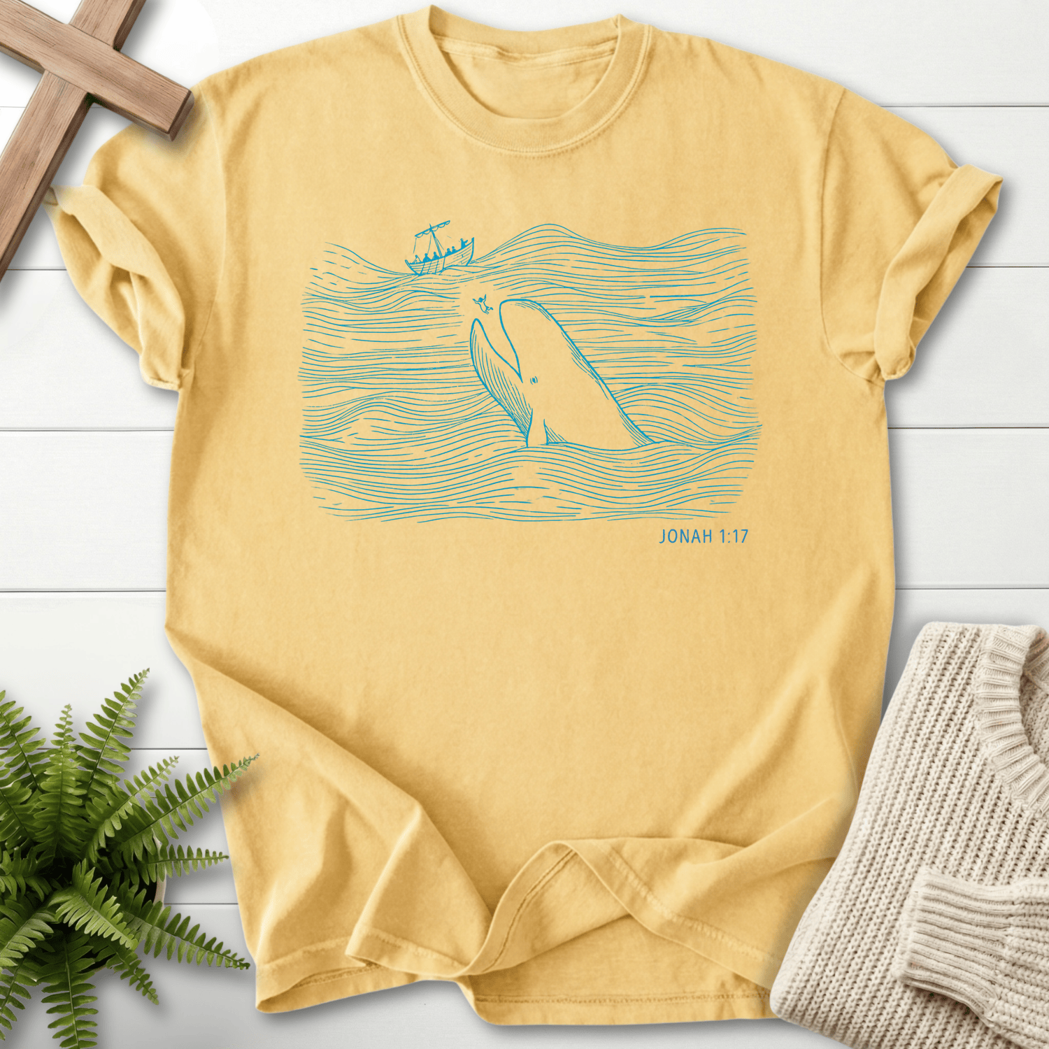 Butter women's Christian t-shirt with a minimalist Jonah whale ocean illustration, inspired by Jonah 1:17