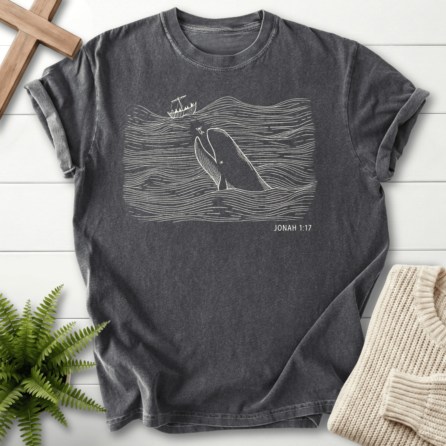 Pepper women's Christian t-shirt with minimalist whale and wave graphic, inspired by Jonah 1:17