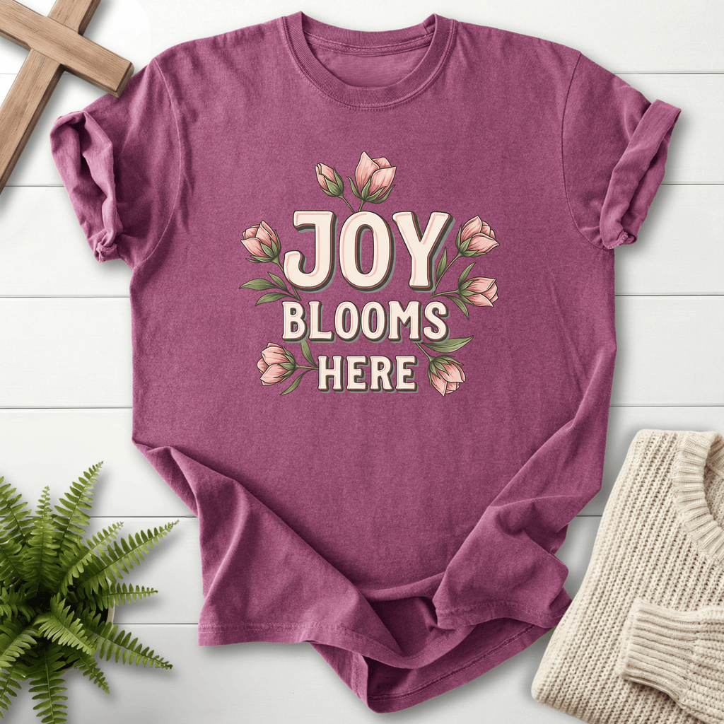 Berry women's Christian t-shirt with a floral "Joy Blooms Here" design and illustrated blooms