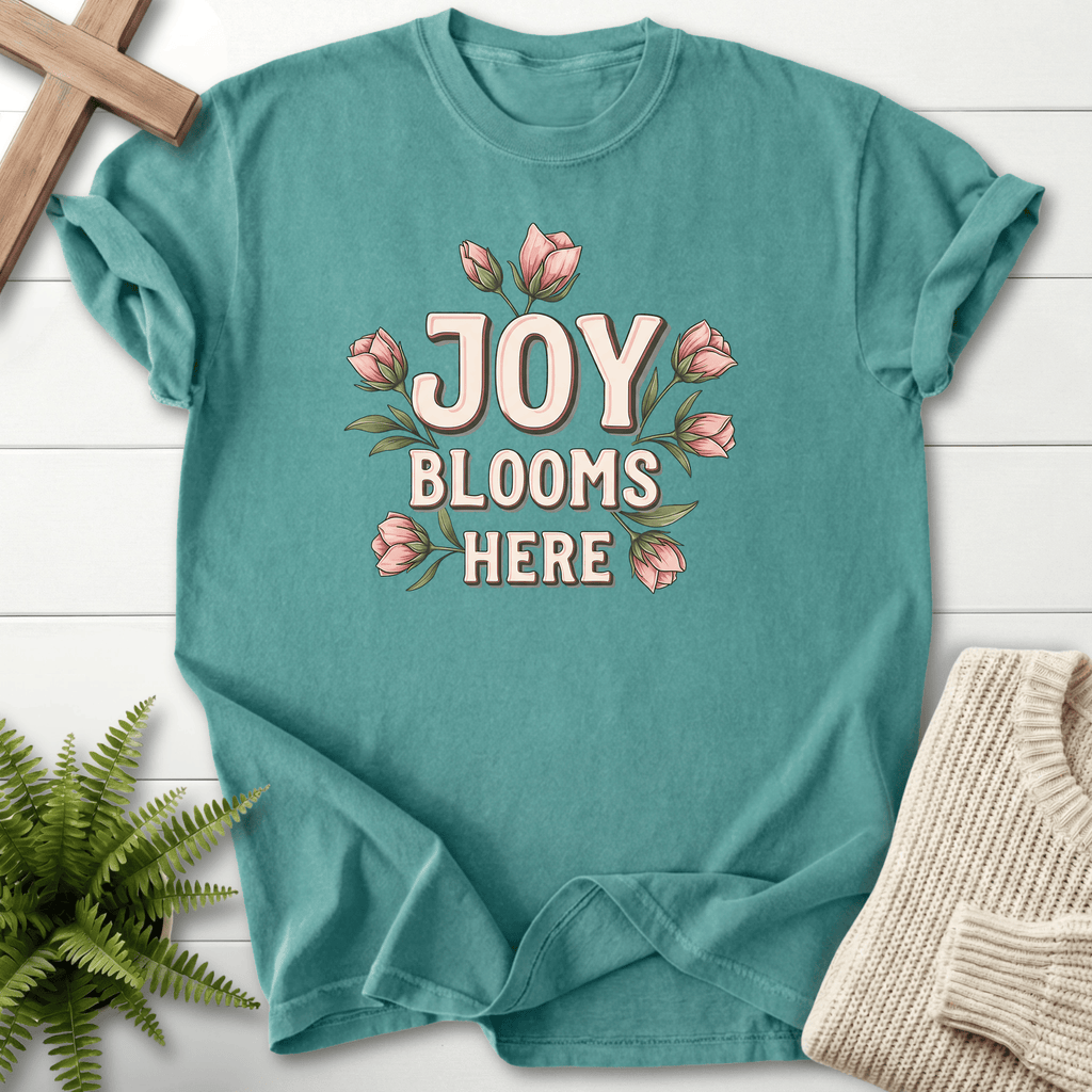 Chalky Mint women's Christian t-shirt with floral "Joy Blooms Here" typography and pink blossom illustration