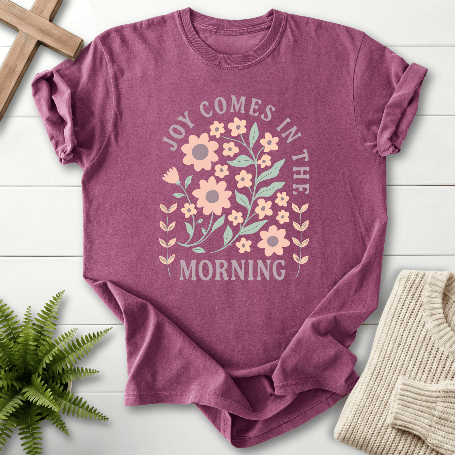 Berry women's Christian t-shirt with a pink boho floral "Joy Comes in the Morning" design