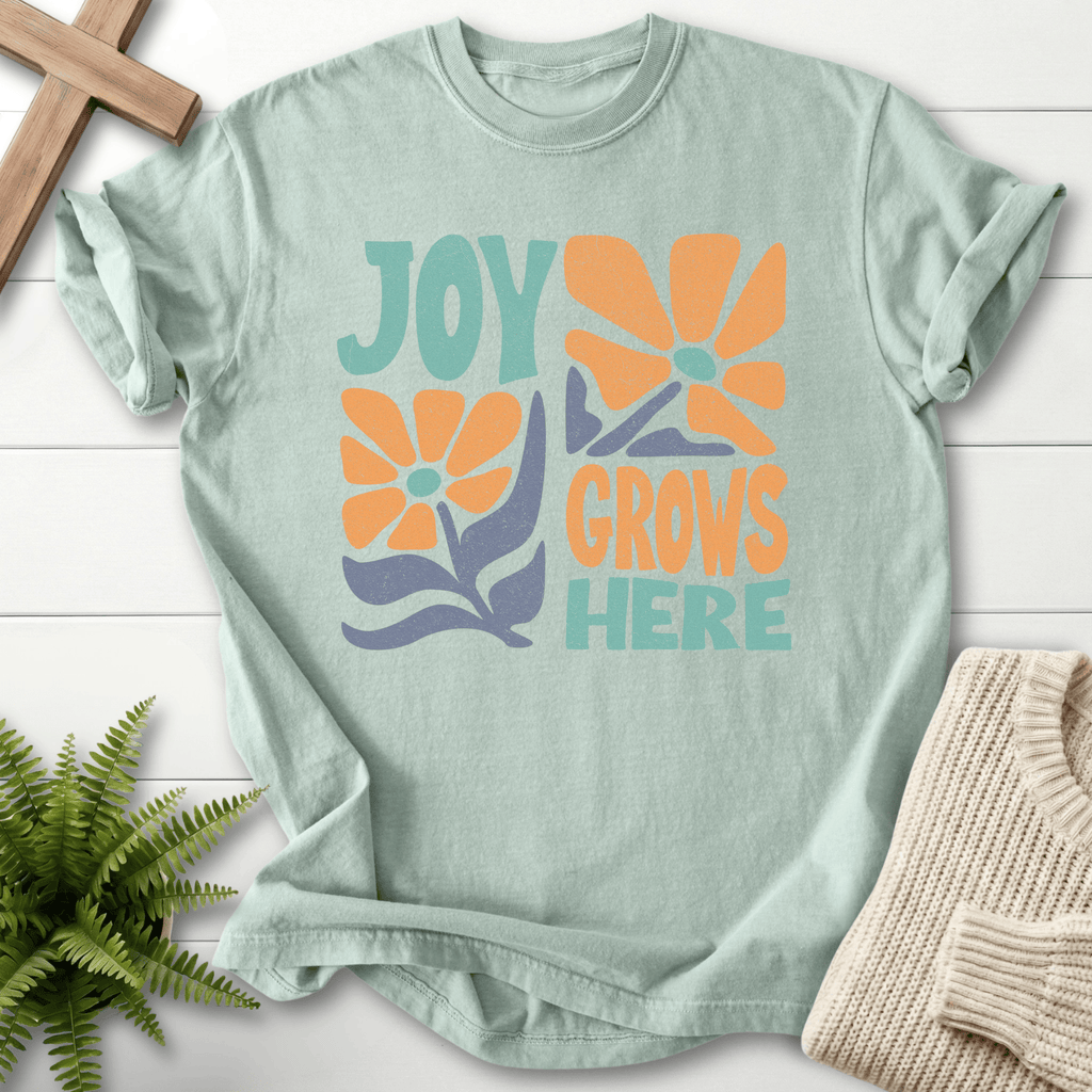 Bay women's Christian t-shirt with groovy "Joy Grows Here" floral block text, Comfort Colors 1717