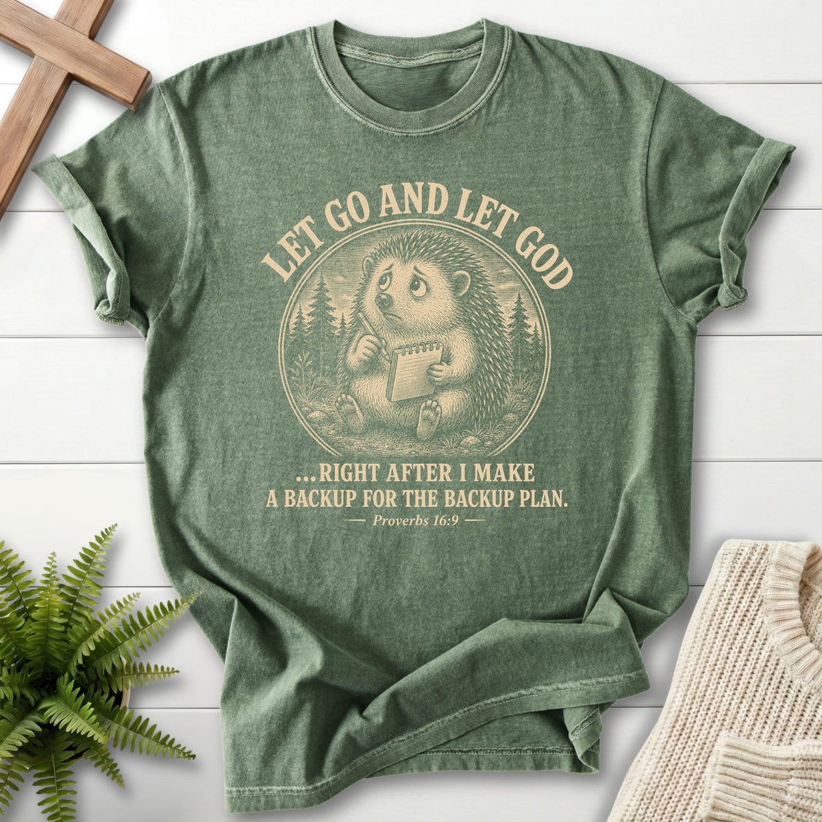 Moss color option for the Let Go and Let God Backup Plan Christian graphic tee with "Let Go and Let God Backup Plan T-Shirt" Proverbs 16:9.