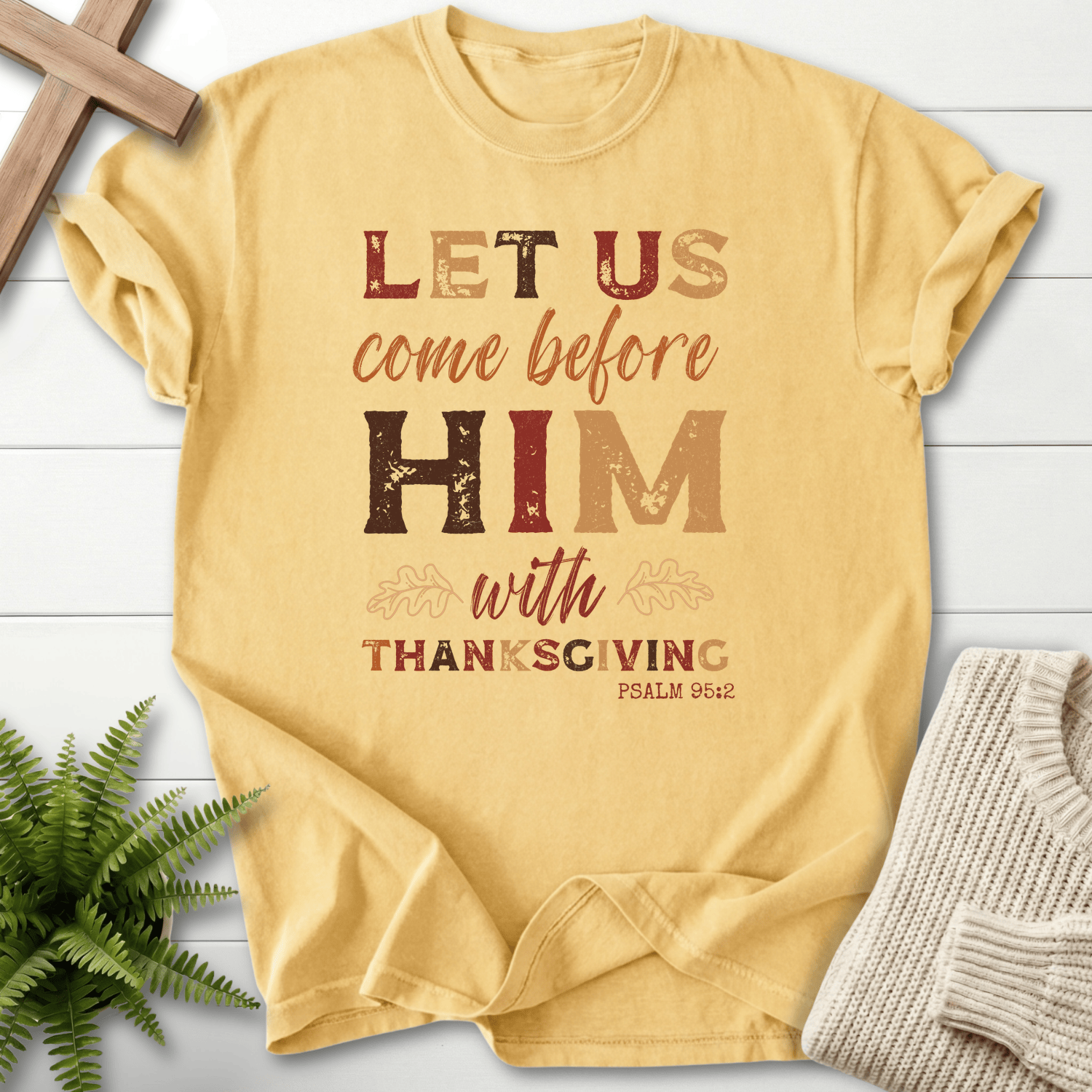 Butter faith-based tee with distressed fall lettering and oak leaf accents, Comfort Colors 1717, inspired by Psalm 95:2.
