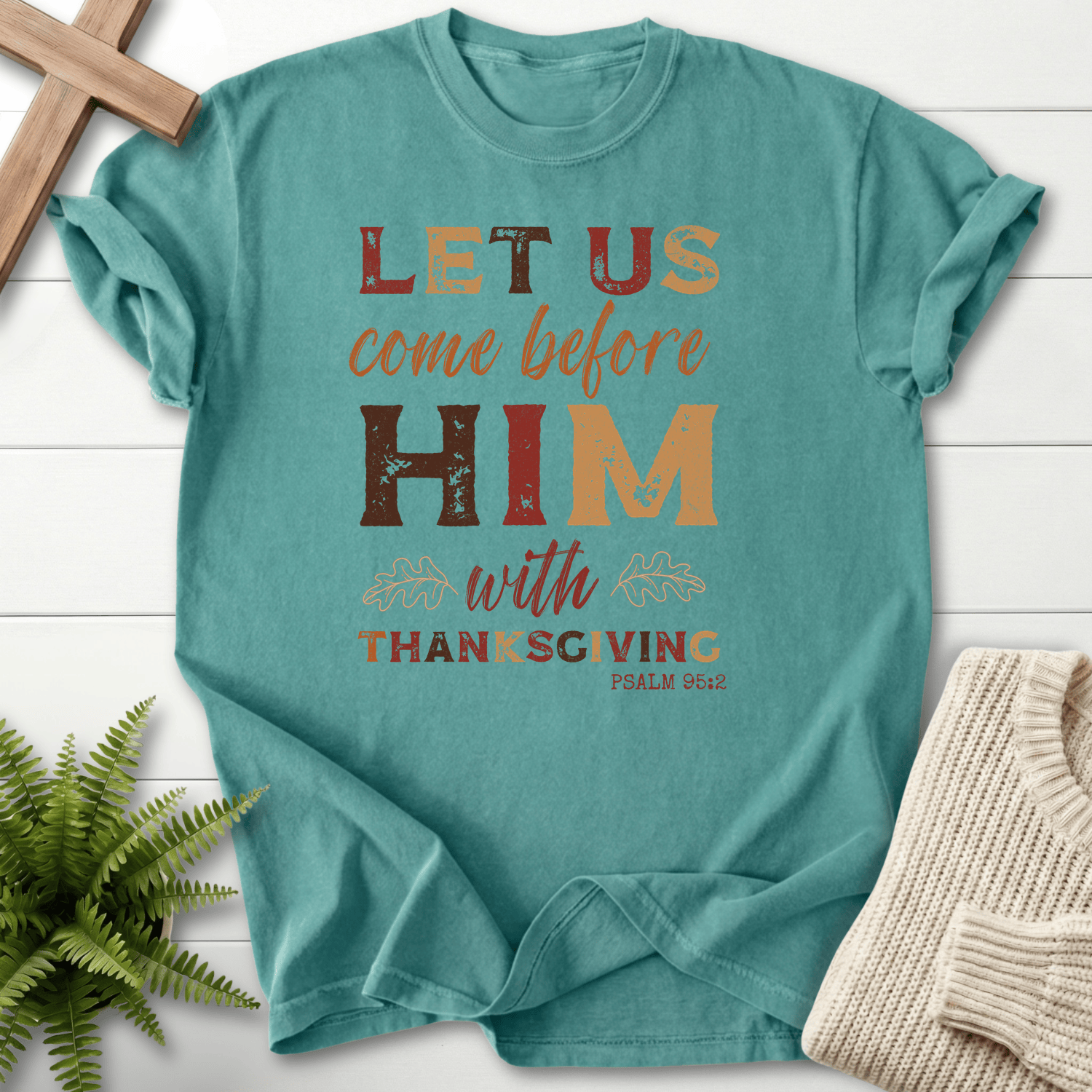 Chalky Mint Christian t-shirt for women with distressed autumn leaf design and Let Us Come Before Him With Thanksgiving, inspired by Psalm 95:2.