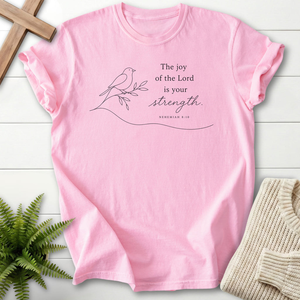 Flat lay of a Blossom garment-dyed Christian tee featuring minimalist design with "Lord is your Strength T-Shirt" Nehemiah 8:10.