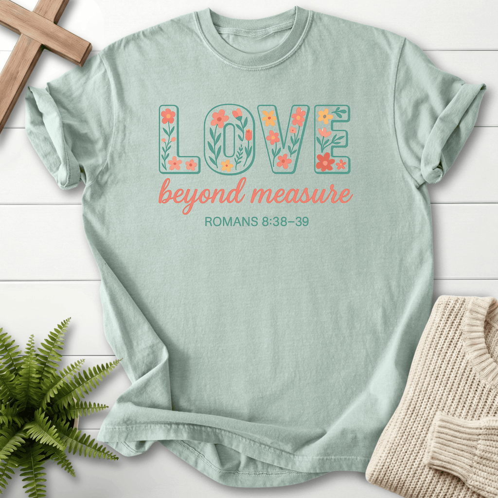Bay women's Bible verse tee with flower-filled LOVE block letters, inspired by Romans 8:38-39.