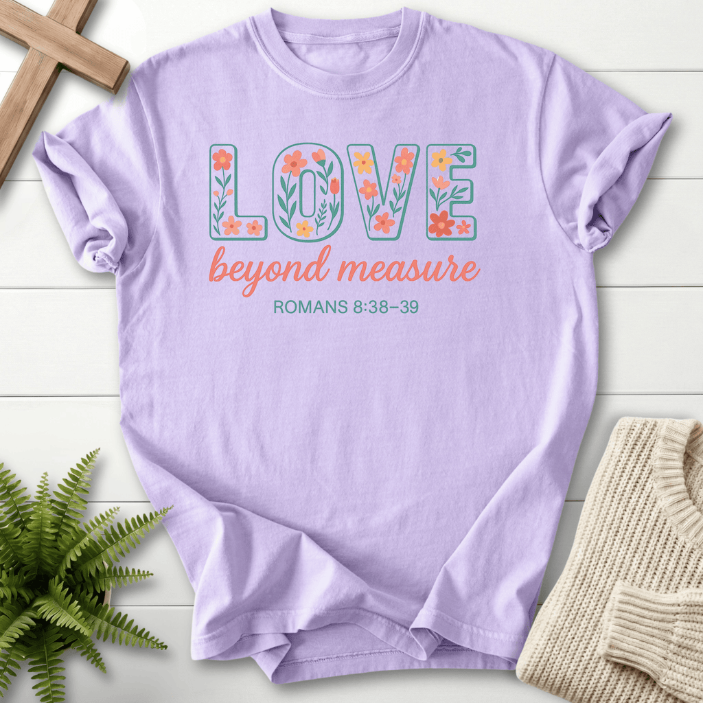 Orchid garment-dyed Christian t-shirt with "Love Beyond Measure" floral letters, inspired by Romans 8:38-39.