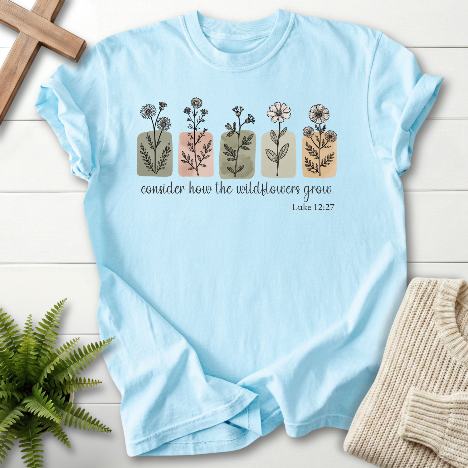 Chambray women's Christian t-shirt with delicate botanical illustration, inspired by Luke 12:27.