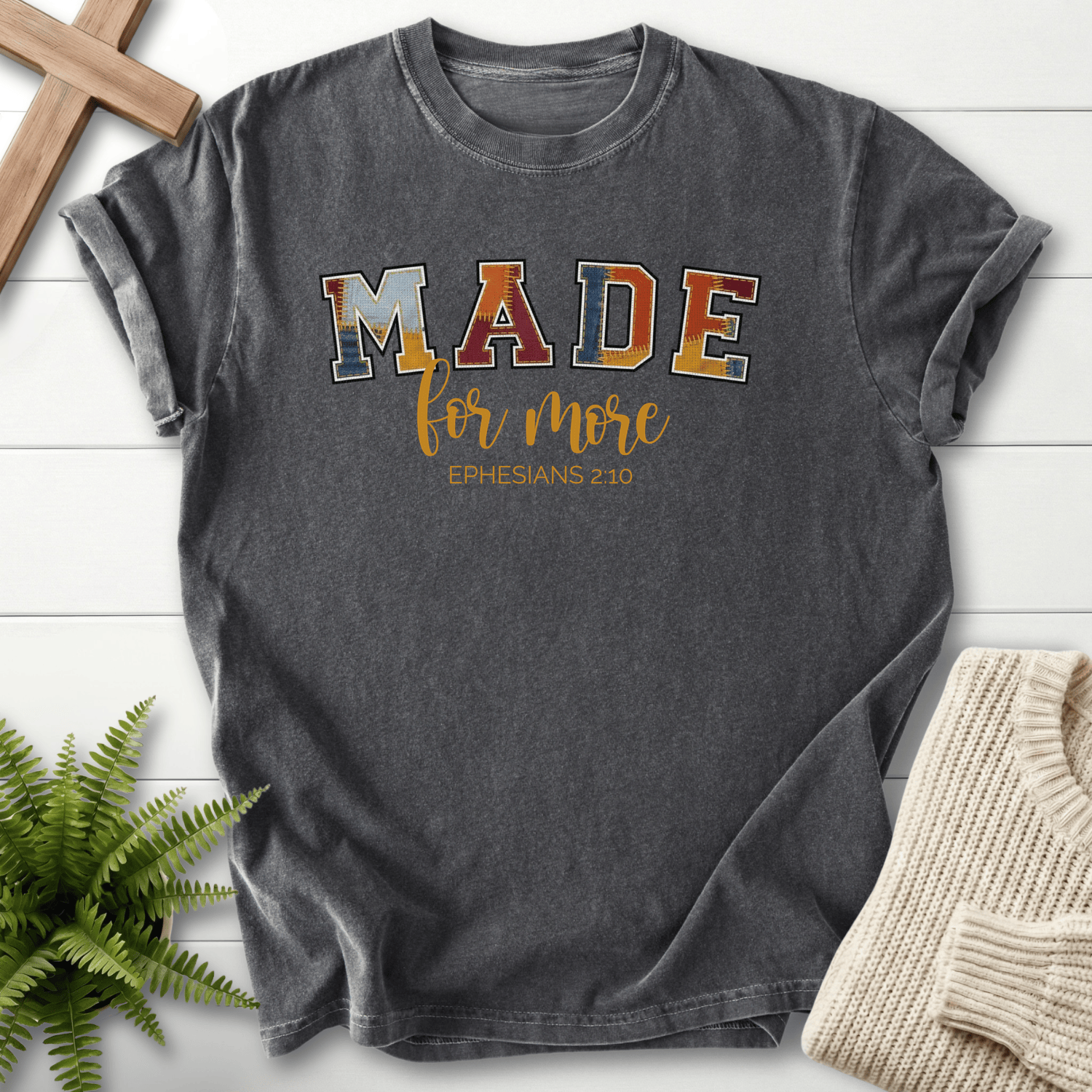 Pepper women's faith t-shirt with multicolored patchwork MADE letters, inspired by Ephesians 2:10.