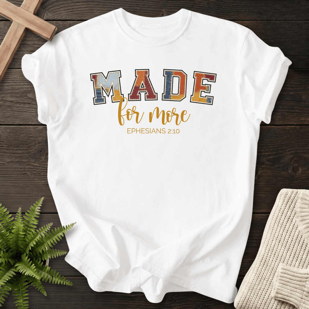 White women's Christian t-shirt with colorful textured block letters, inspired by Ephesians 2:10.