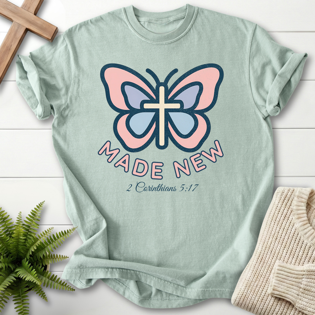 Bay women's Christian t-shirt with stylized cross butterfly design, inspired by 2 Corinthians 5:17.