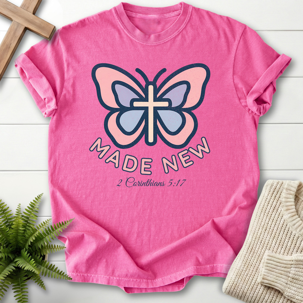 Crunchberry women's Bible verse tee with pink and blue butterfly and cross motif, inspired by 2 Corinthians 5:17.