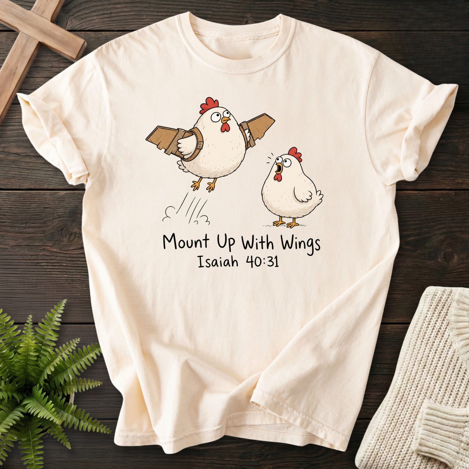 Flat lay of an Ivory Bible verse tee featuring "Mount Up With Wings Isaiah 40:31 T-Shirt" Isaiah 40:31.