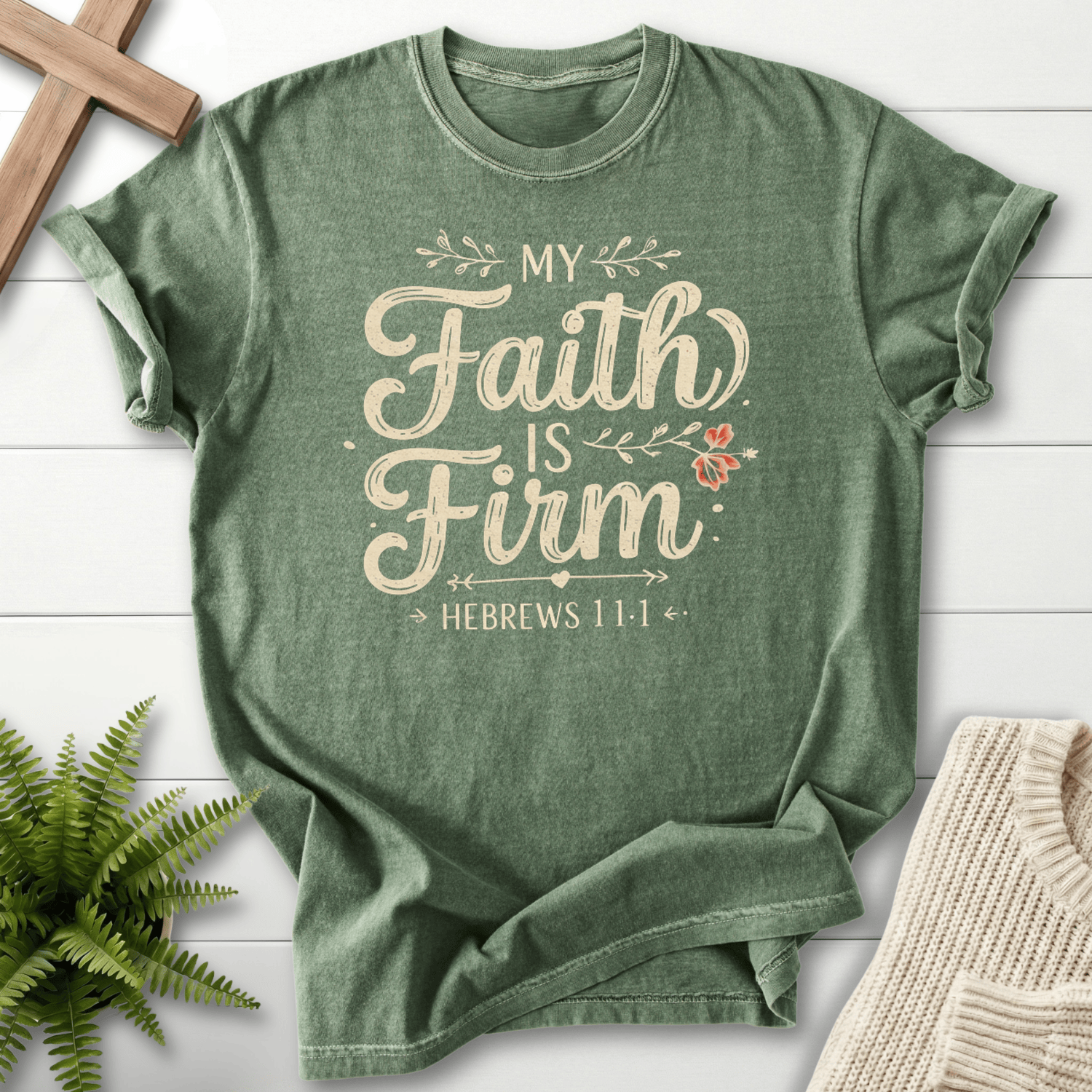 Moss green women's Christian t-shirt with elegant 'My Faith is Firm' script lettering, inspired by Hebrews 11:1.