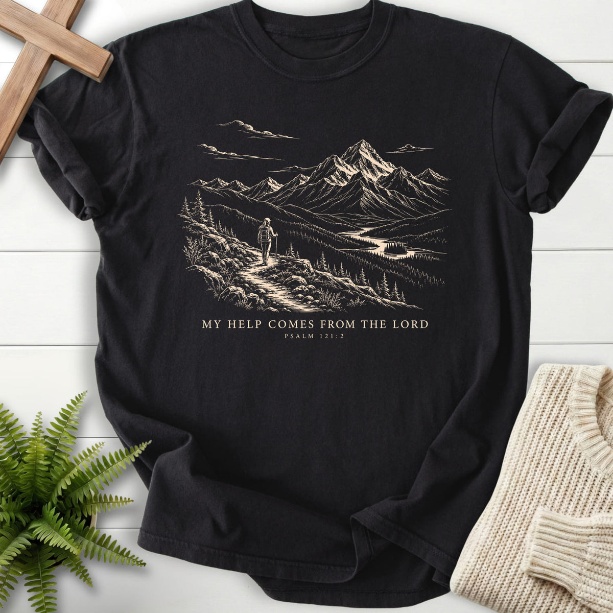 Flat lay of a Black Comfort Colors 1717 garment-dyed Christian tee featuring mountain graphic with "My Help Comes from the Lord T-Shirt".