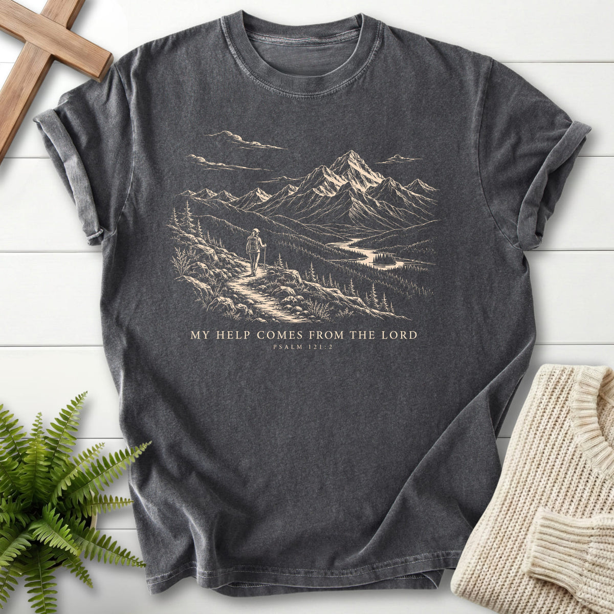 Flatlay of a Pepper Christian shirt with mountain graphic with "My Help Comes from the Lord T-Shirt".