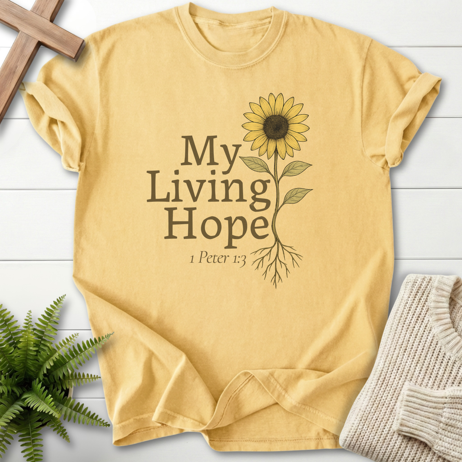 Butter yellow women's Christian t-shirt with sunflower botanical 'My Living Hope' illustration, inspired by 1 Peter 1:3.