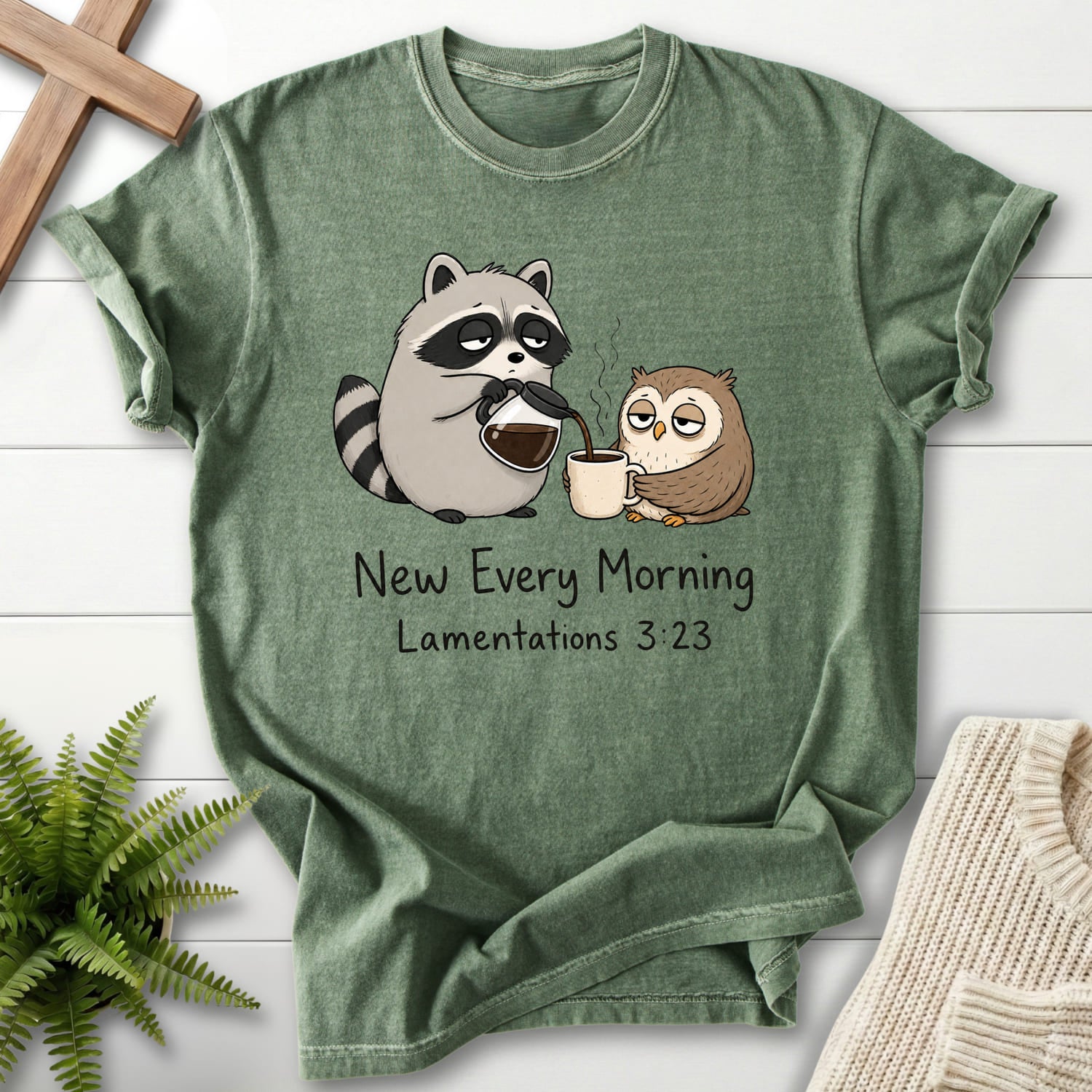 Moss color option for the New Every Morning Raccoon Owl garment-dyed Christian tee with "New Every Morning Raccoon Owl T-Shirt" Lamentations 3:23.