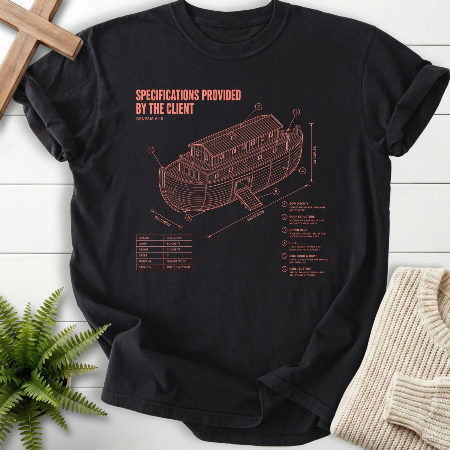 Flat lay of a Black Comfort Colors 1717 garment-dyed Christian tee featuring "Noahs Ark Blueprint Genesis 6:15 T-Shirt" Blueprint Genesis 6:15.