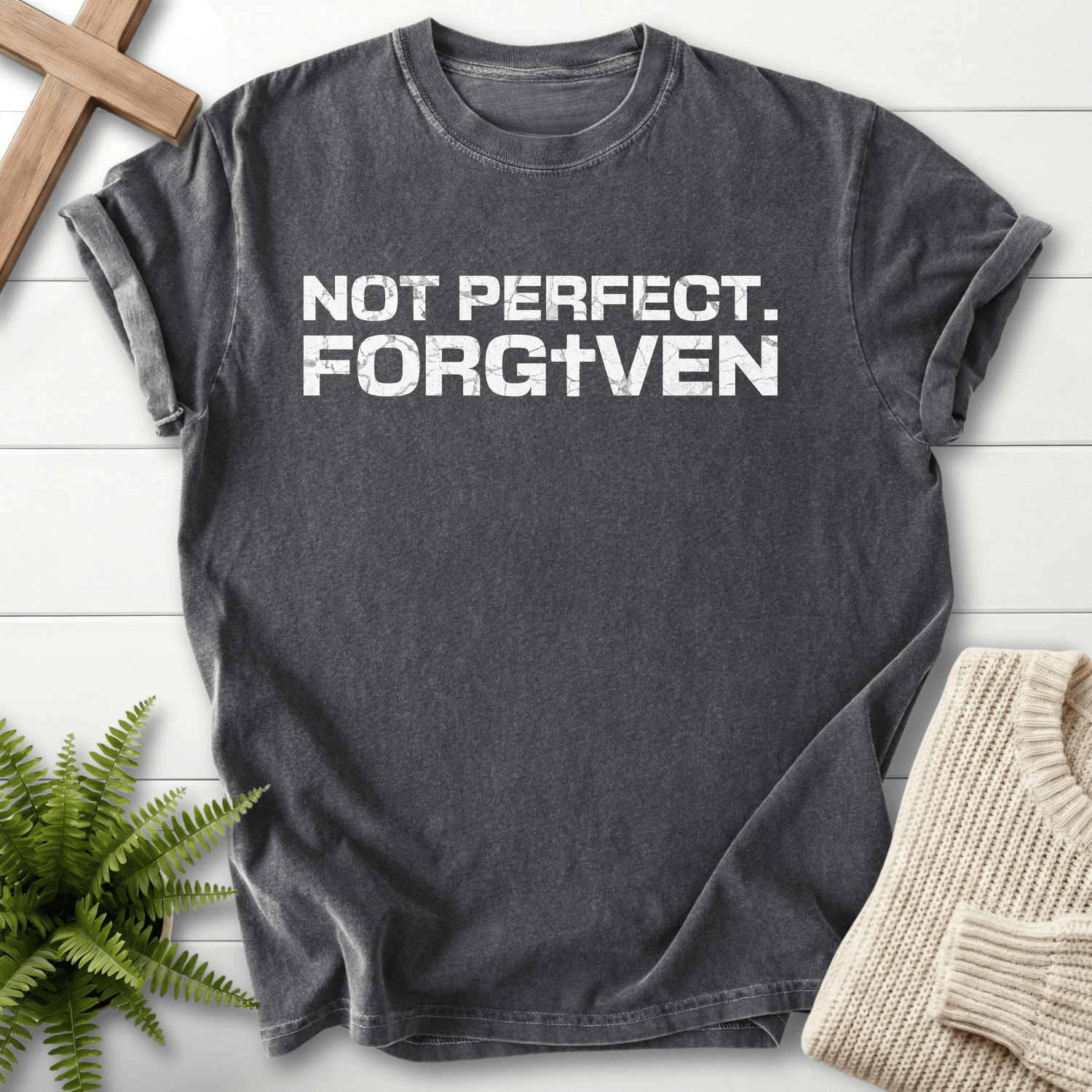 Pepper grey women's Christian t-shirt with grunge 'Not Perfect. Forgiven' block text and cross detail.