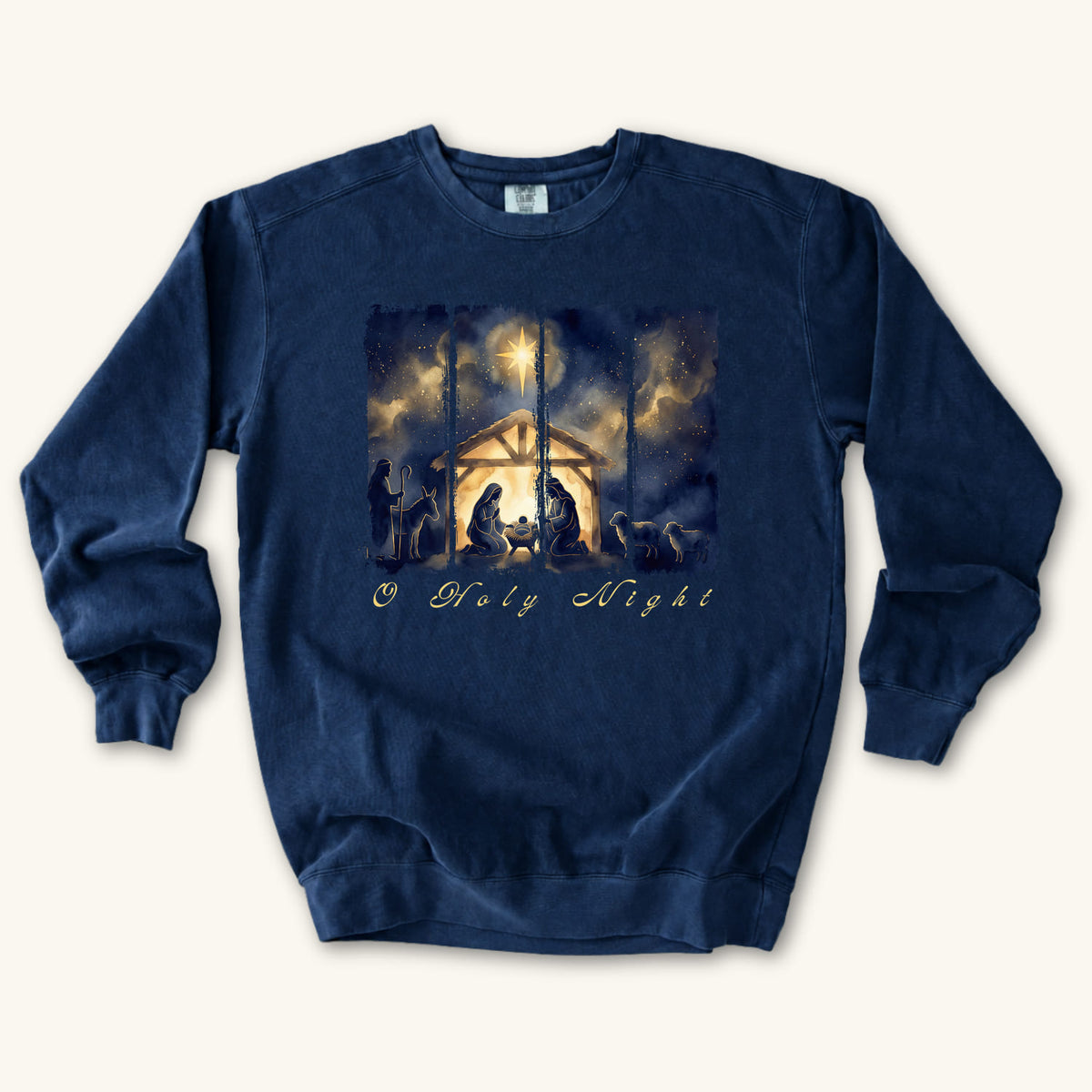 True Navy Christian Christmas sweatshirt with a painted nativity of Mary, Joseph and the manger in a glowing stable under a bright star, with O Holy Night in script.