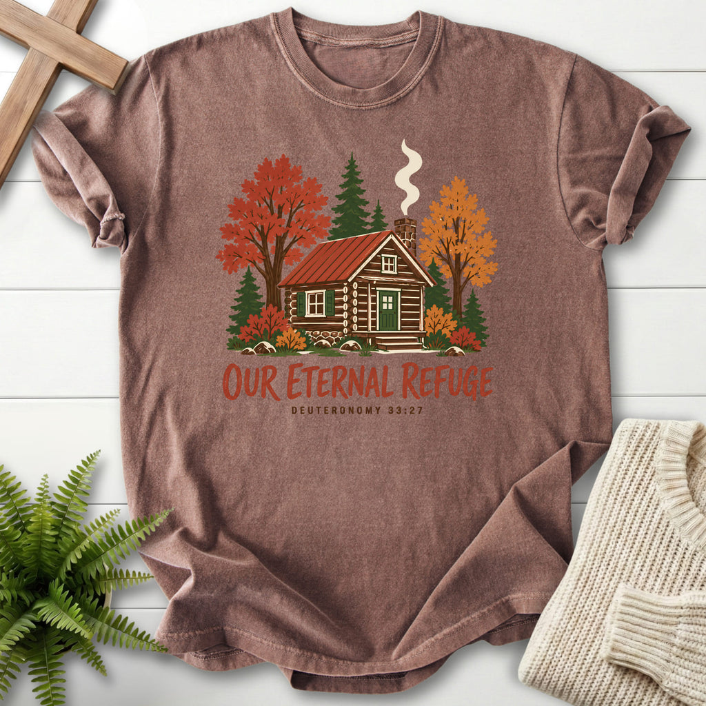 Flatlay of an Espresso women's Christian tee with "Our Eternal Refuge Autumn Faith T-Shirt" Deuteronomy 33:27.