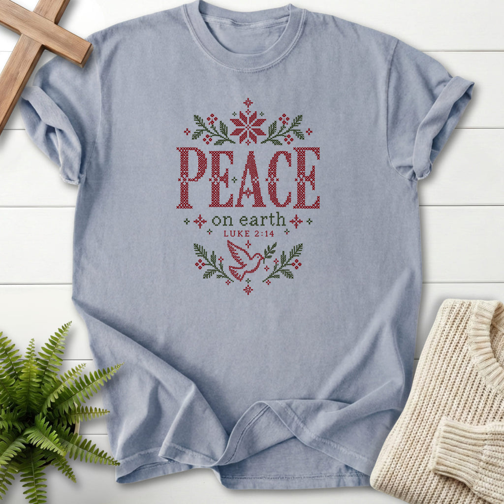 Flat lay of a Granite Scripture shirt featuring "Peace on Earth T-Shirt" Luke 2:14.
