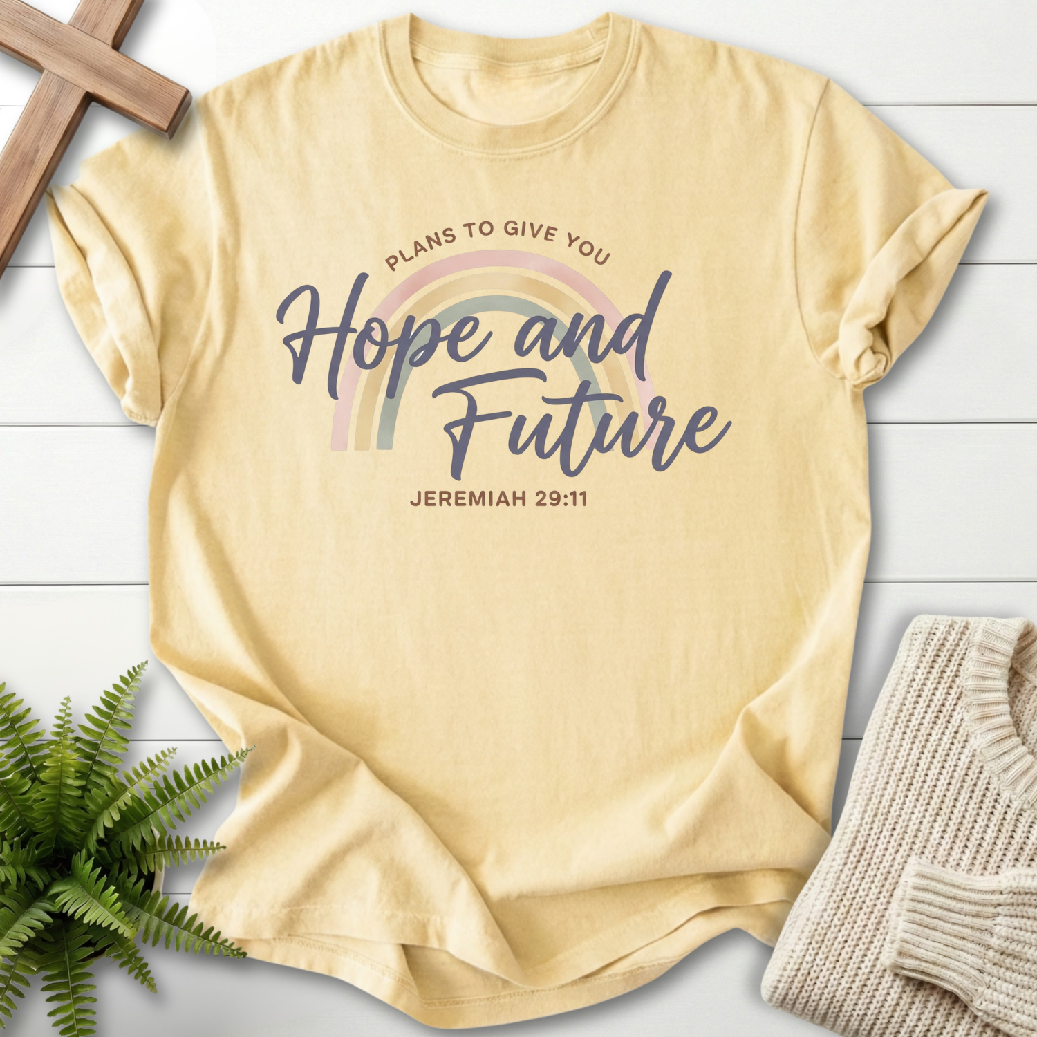 Banana women's Christian t-shirt with pastel rainbow arc and "Plans to Give You Hope and Future," inspired by Jeremiah 29:11.