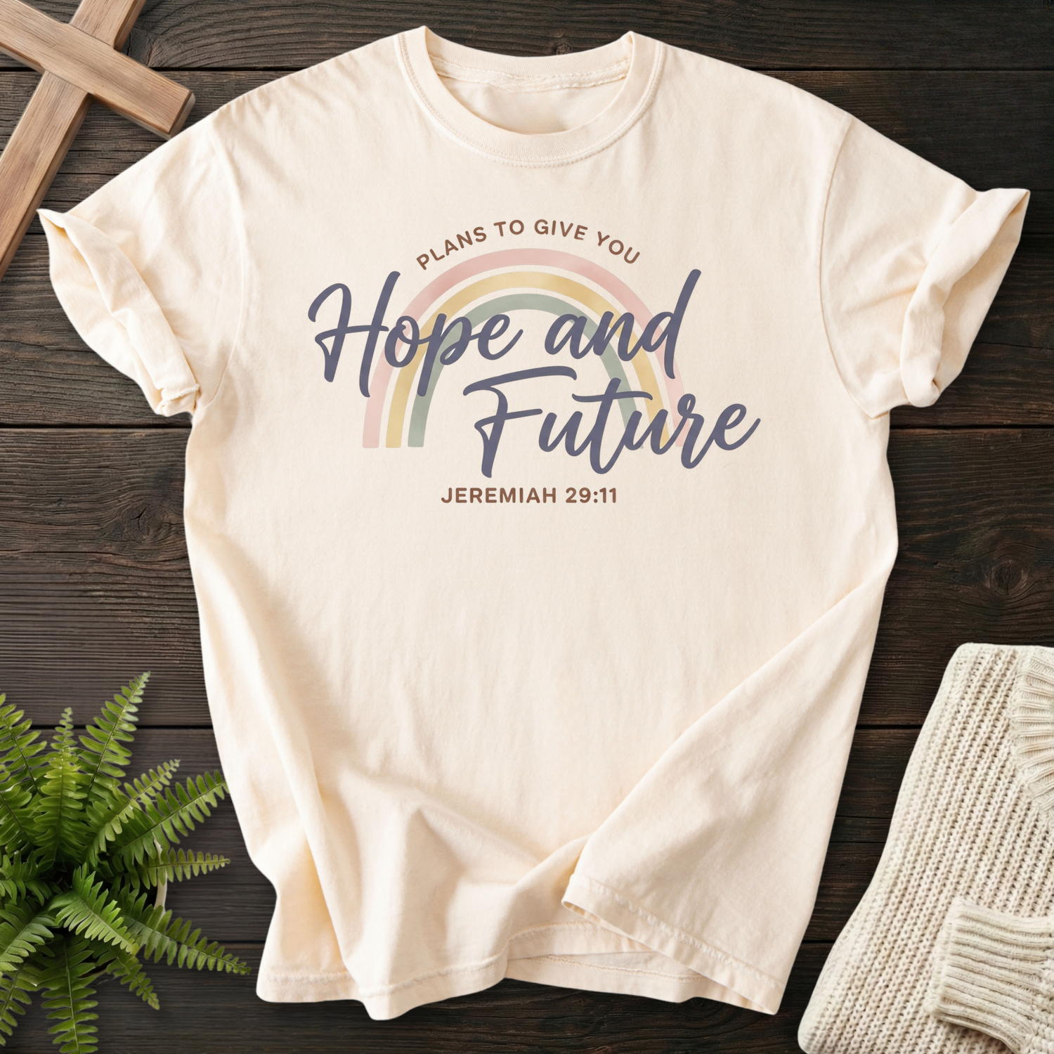 Ivory women's Christian t-shirt with pastel rainbow and "Hope and Future" script, inspired by Jeremiah 29:11.