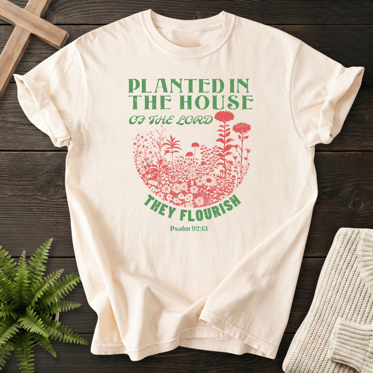 Ivory women's Christian t-shirt with wildflower semicircle and "Planted in the House of the Lord," inspired by Psalm 92:13.