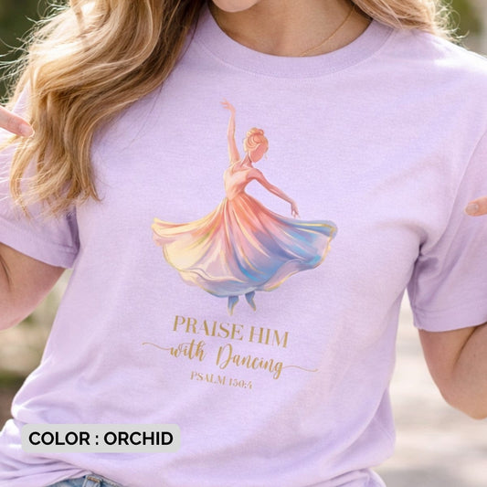 Orchid purple Bible Verse Shirt with a watercolor illustration of a dancer in a flowing dress, centered above the worship lyric "Praise Him with Dancing" and the verse "Psalm 150:4" in gold text.