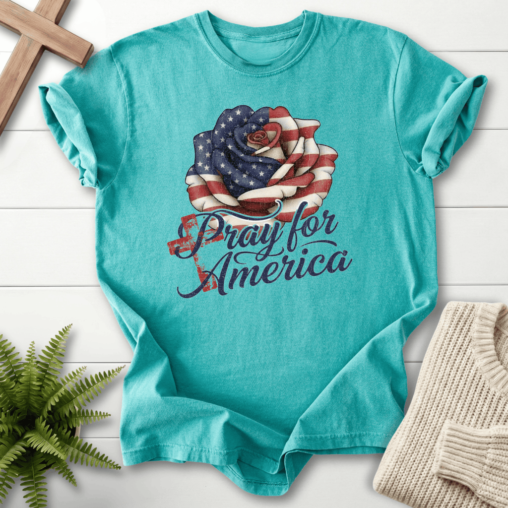Seafoam women's Christian t-shirt with patriotic flag rose and "Pray for America" navy script.