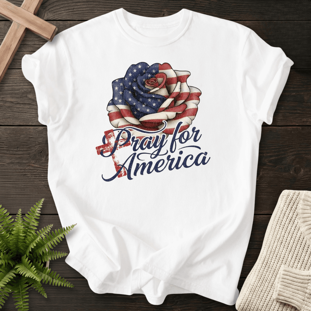White women's Christian t-shirt with American flag rose and "Pray for America" patriotic design.