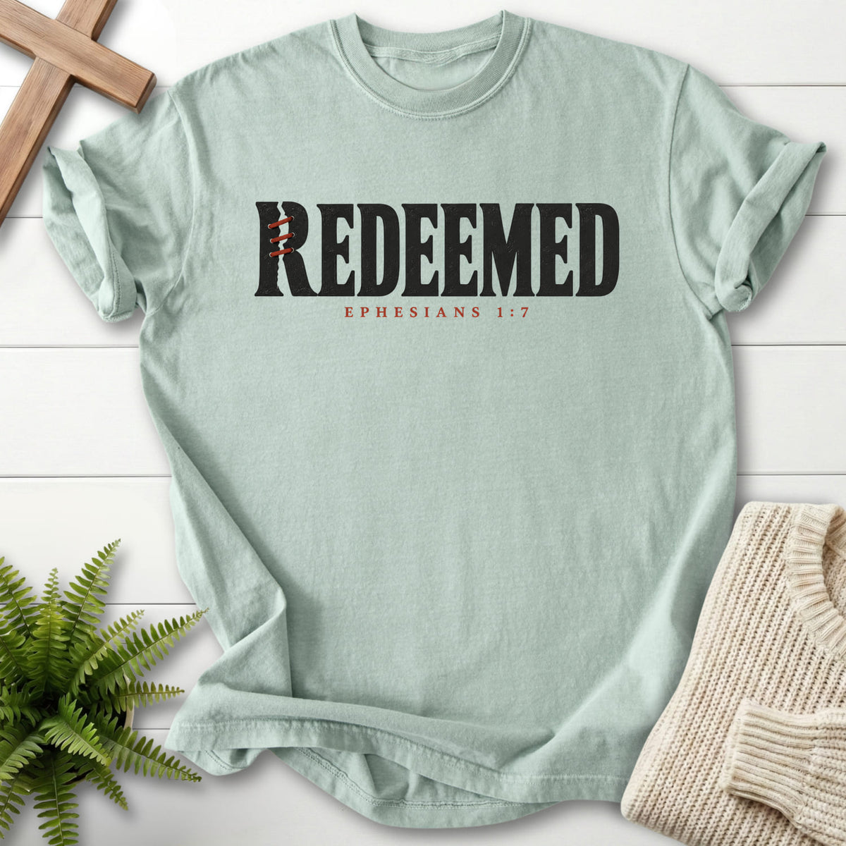 Bay Redeemed T-shirt flat lay mockup, Ephesians 1:7 Christian apparel for women