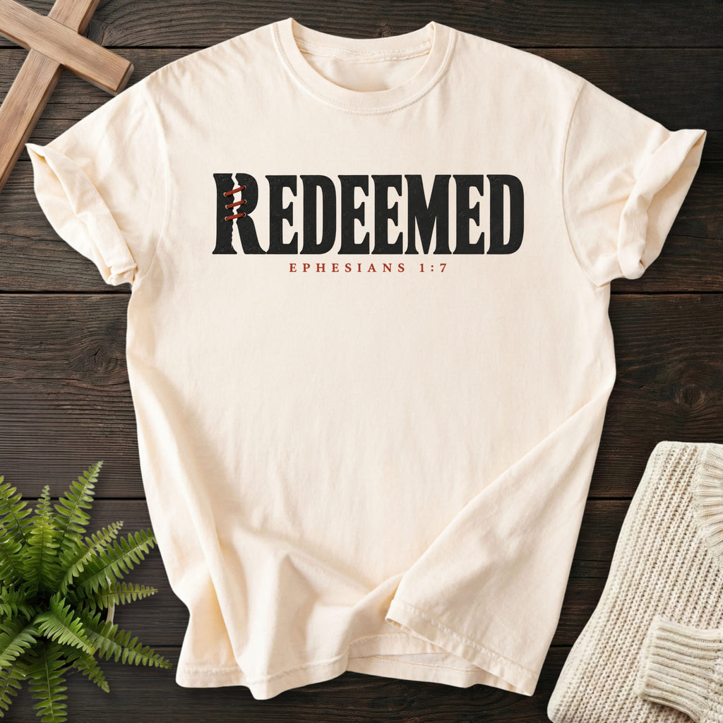 Ivory Redeemed T-shirt flat lay mockup, Ephesians 1:7 Christian apparel for women