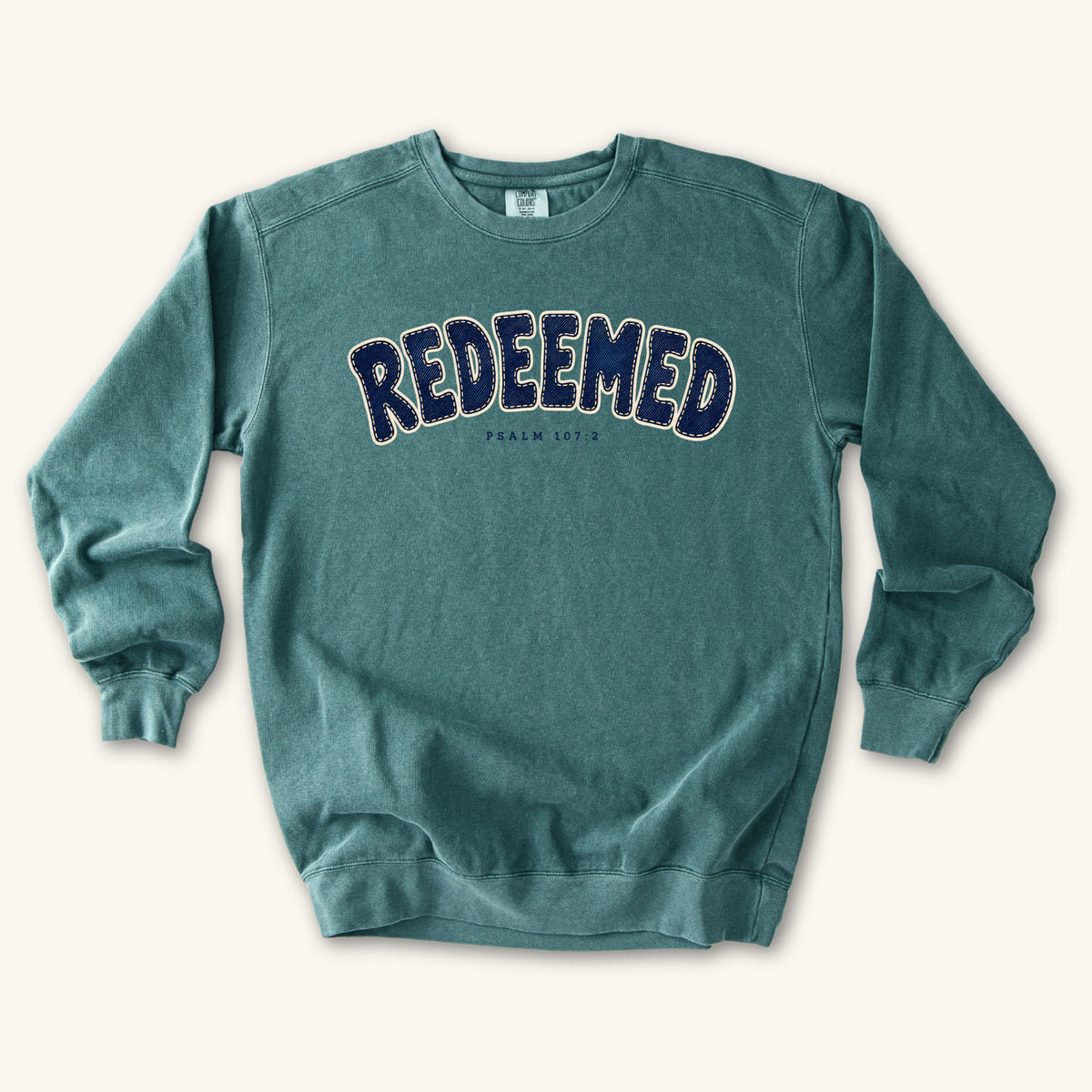Blue Spruce Redeemed sweatshirt flat lay mockup, Psalm 107:2 Christian apparel for women