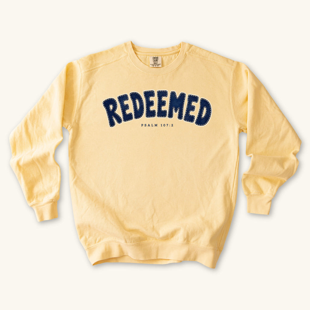 Butter Redeemed sweatshirt flat lay mockup, Psalm 107:2 Christian apparel for women