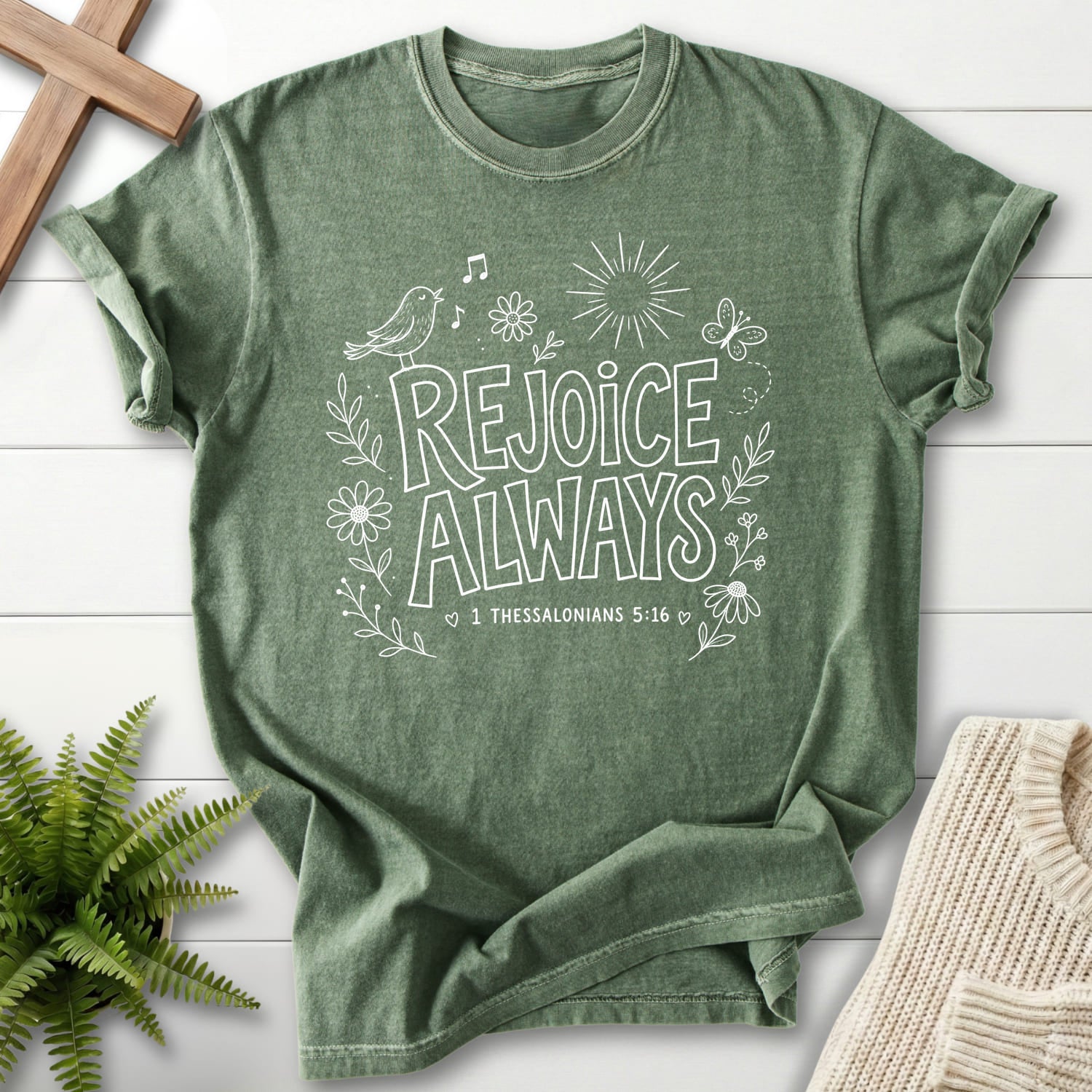 Moss color option for the Rejoice Always garment-dyed Christian tee with butterfly artwork with "Rejoice Always T-Shirt" 1 Thessalonians.