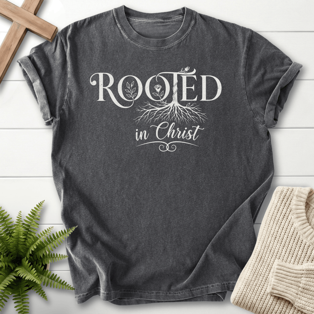 Pepper women's Scripture shirt with "Rooted in Christ" botanical tree illustration.