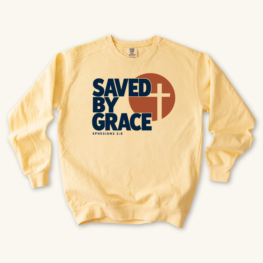 Butter Saved by Grace Bold Cross sweatshirt flat lay mockup, Ephesians 2:8 Christian apparel for women