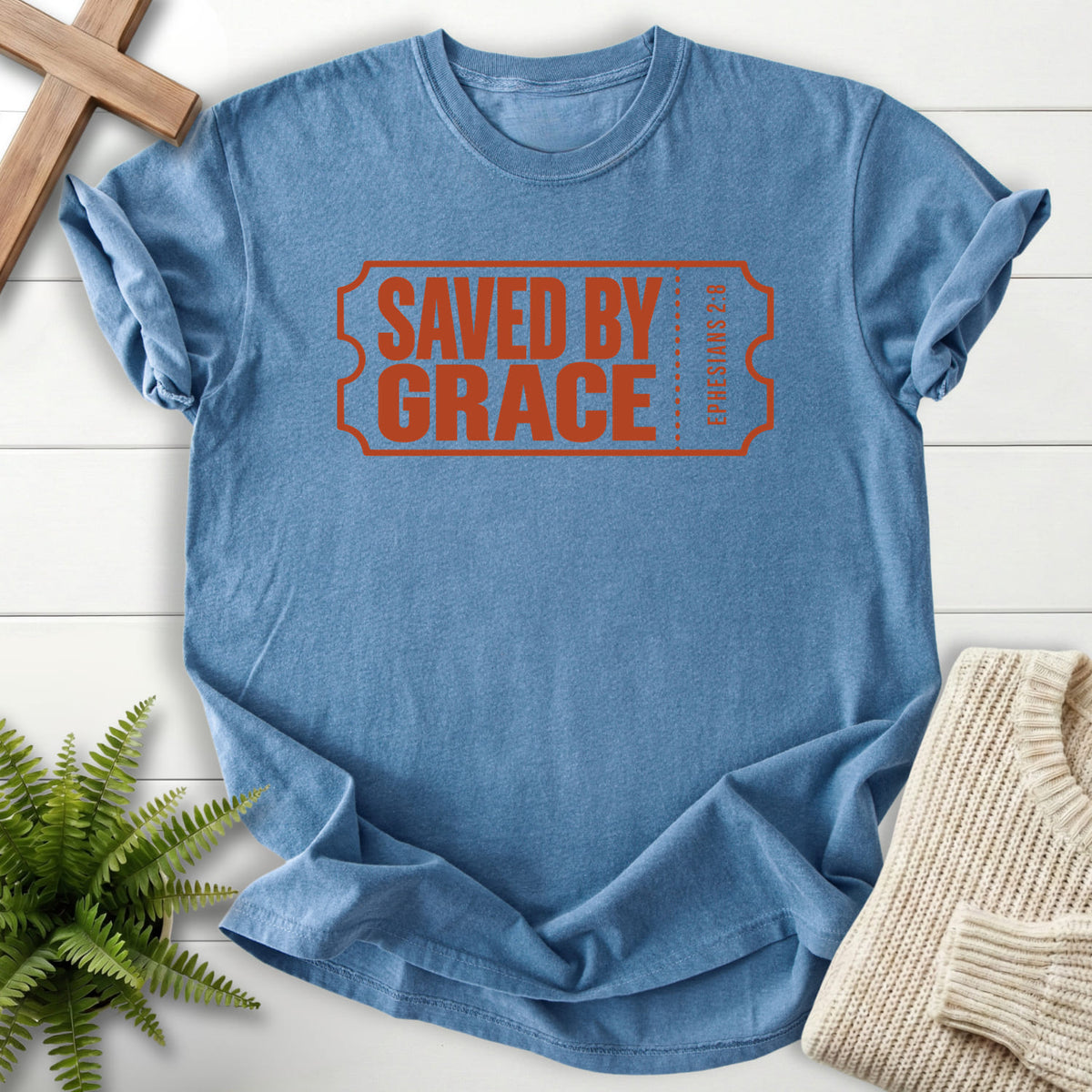 Blue Jean Saved by Grace Ticket T-shirt flat lay mockup, Ephesians 2:8 Christian apparel for women