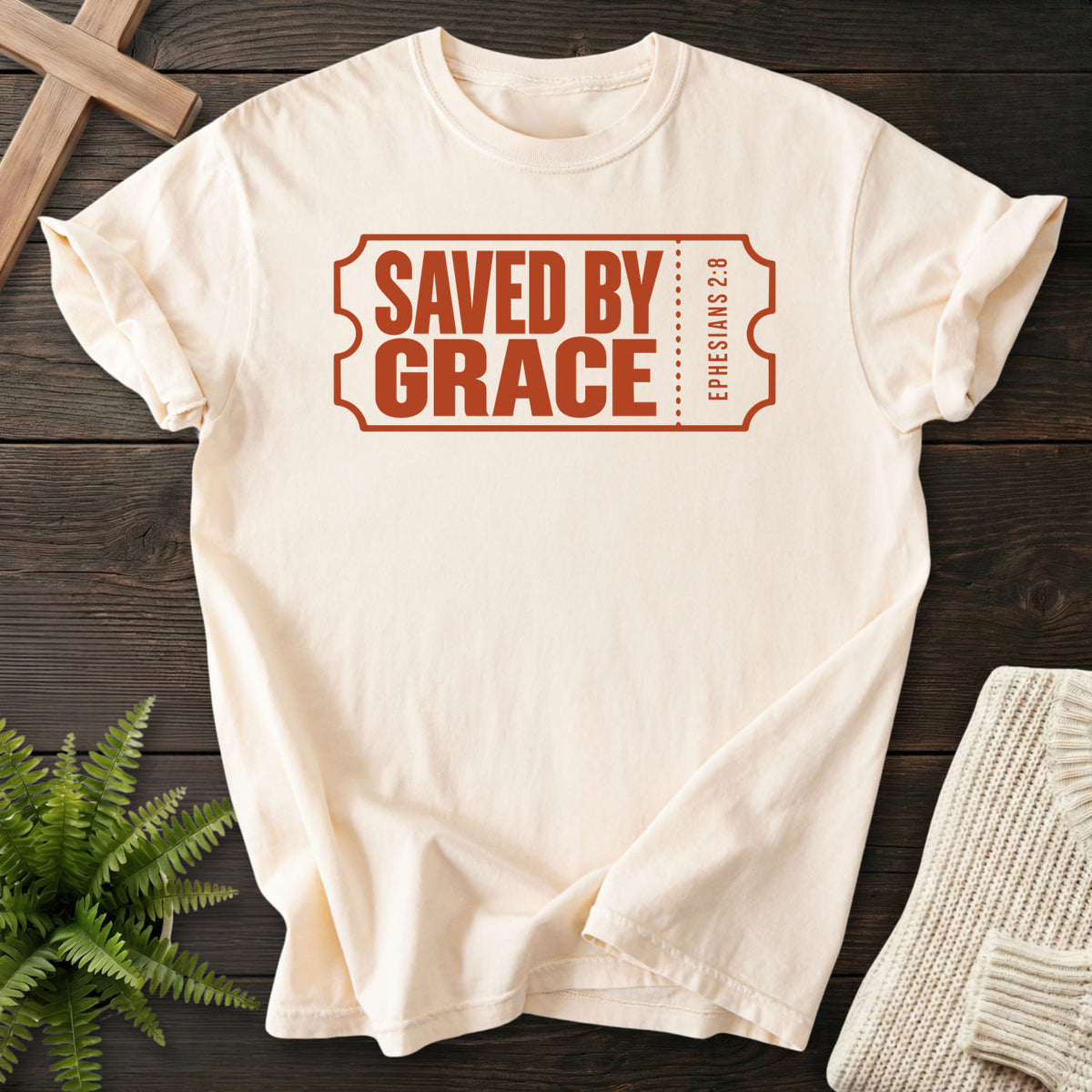 Ivory Saved by Grace Ticket T-shirt flat lay mockup, Ephesians 2:8 Christian apparel for women