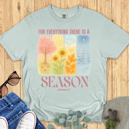 Comfort Colors 1717 bay “For Everything There Is a Season – Ecclesiastes 3:1” t-shirt with soft watercolor art of spring, summer, fall, and winter. A modern Christian shirt and thoughtful Christian mom gift idea.